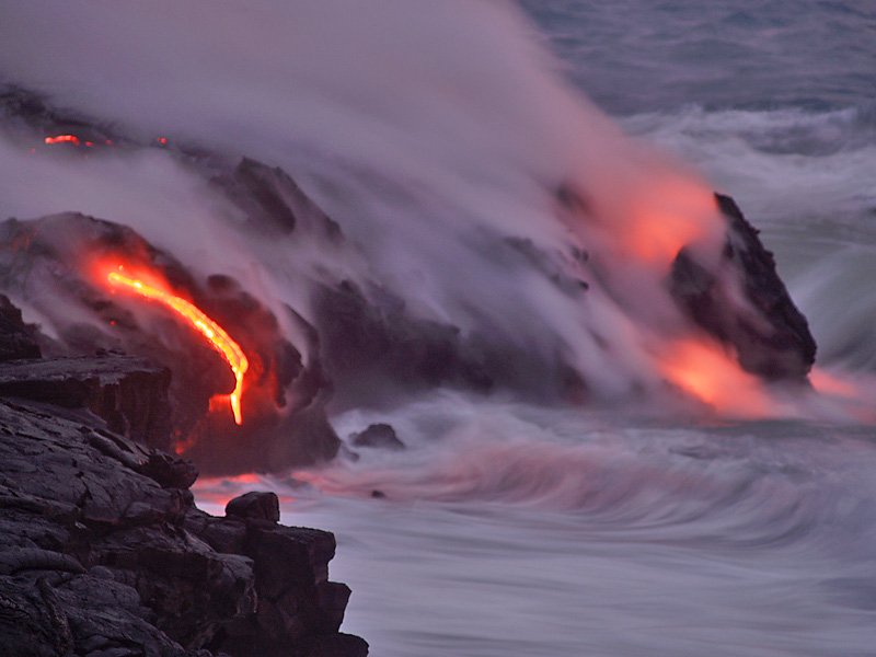 Lava oozes into the sea in Hawaii. Image courtesy of USGS.